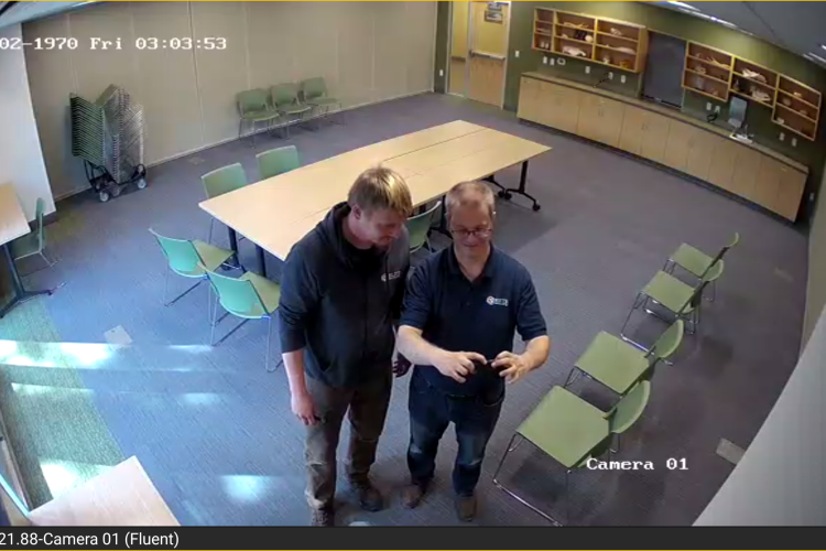 Brent and Homer Reviewing CCTV Camera Placement